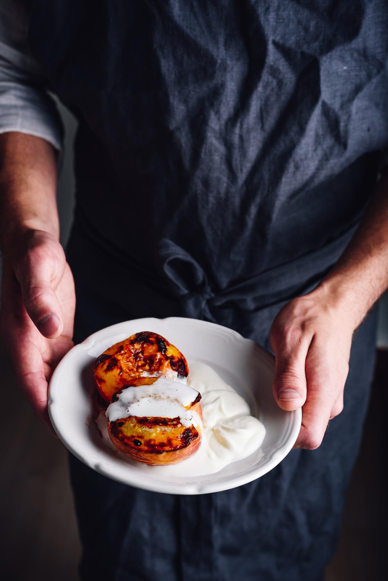 Chef hands finishing dessert